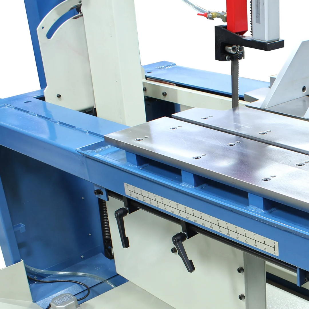Angled view of the worktable and cutting area on the Baileigh 18-Inch Vertical Tilt Frame Bandsaw, 220V 3Ph (BSVT-18P) 1226643 showing the spacious table, blade guide assembly, and tilt-frame design for precision metal cutting.