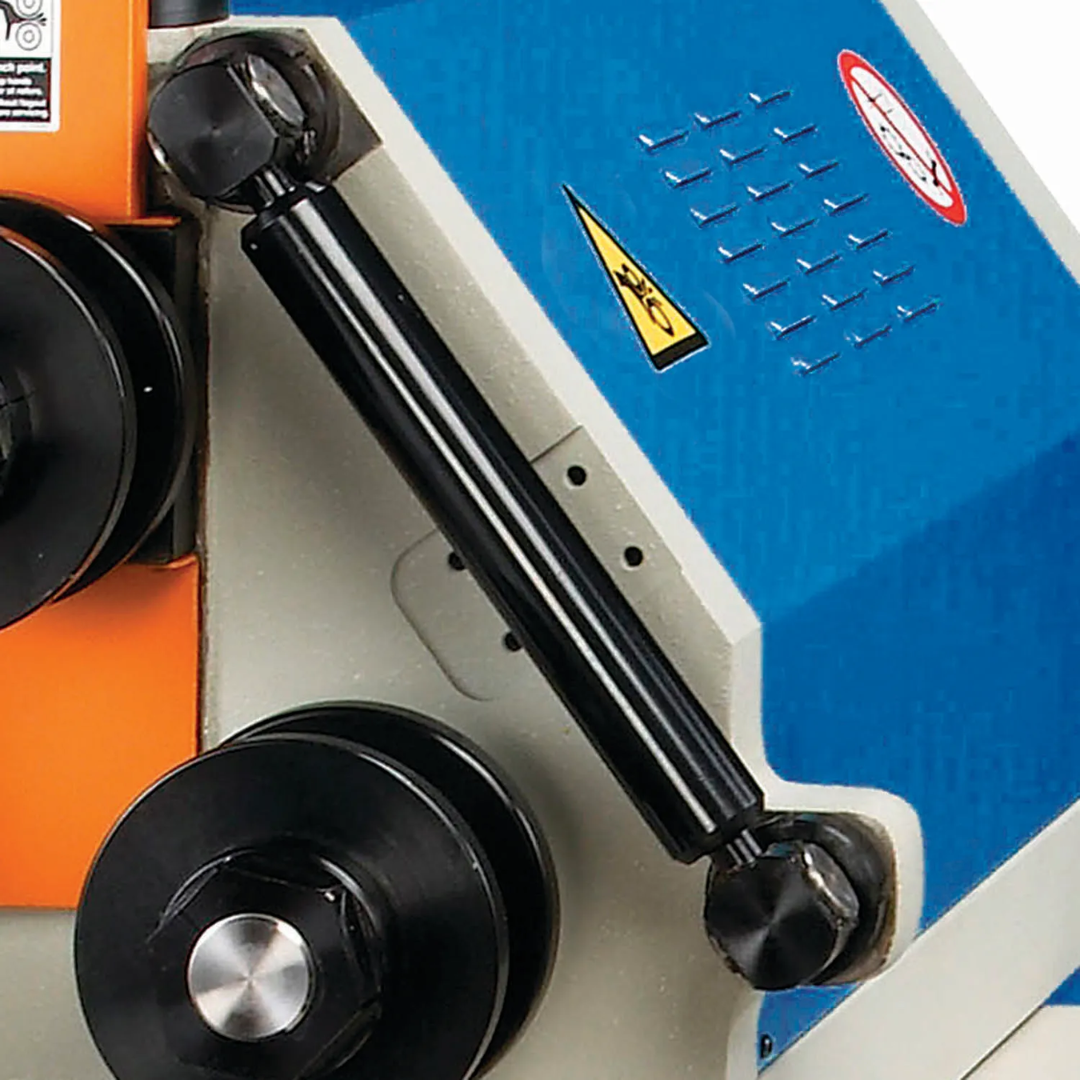 Baileigh Angle Roller R-H55 1006836 close-up of the adjustable hydraulic rolling head with three driven rollers designed for accurate bending of pipe, tube, angle iron, and structural metal profiles.