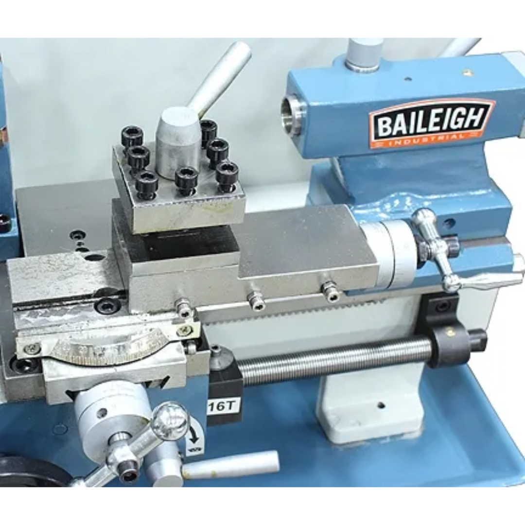 Baileigh Bench Top Lathe (PL-714VS-V2) 1228214 detailed machining area view showing cutting tool setup, workholding components, and adjustable metalworking features.