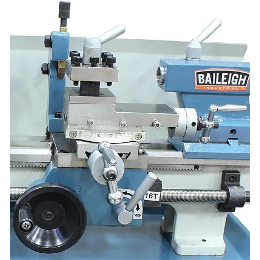Baileigh Bench Top Lathe (PL-714VS-V2) 1228214 front-angle view displaying the carriage, cross slide, chuck, and bed assembly for metalworking applications.