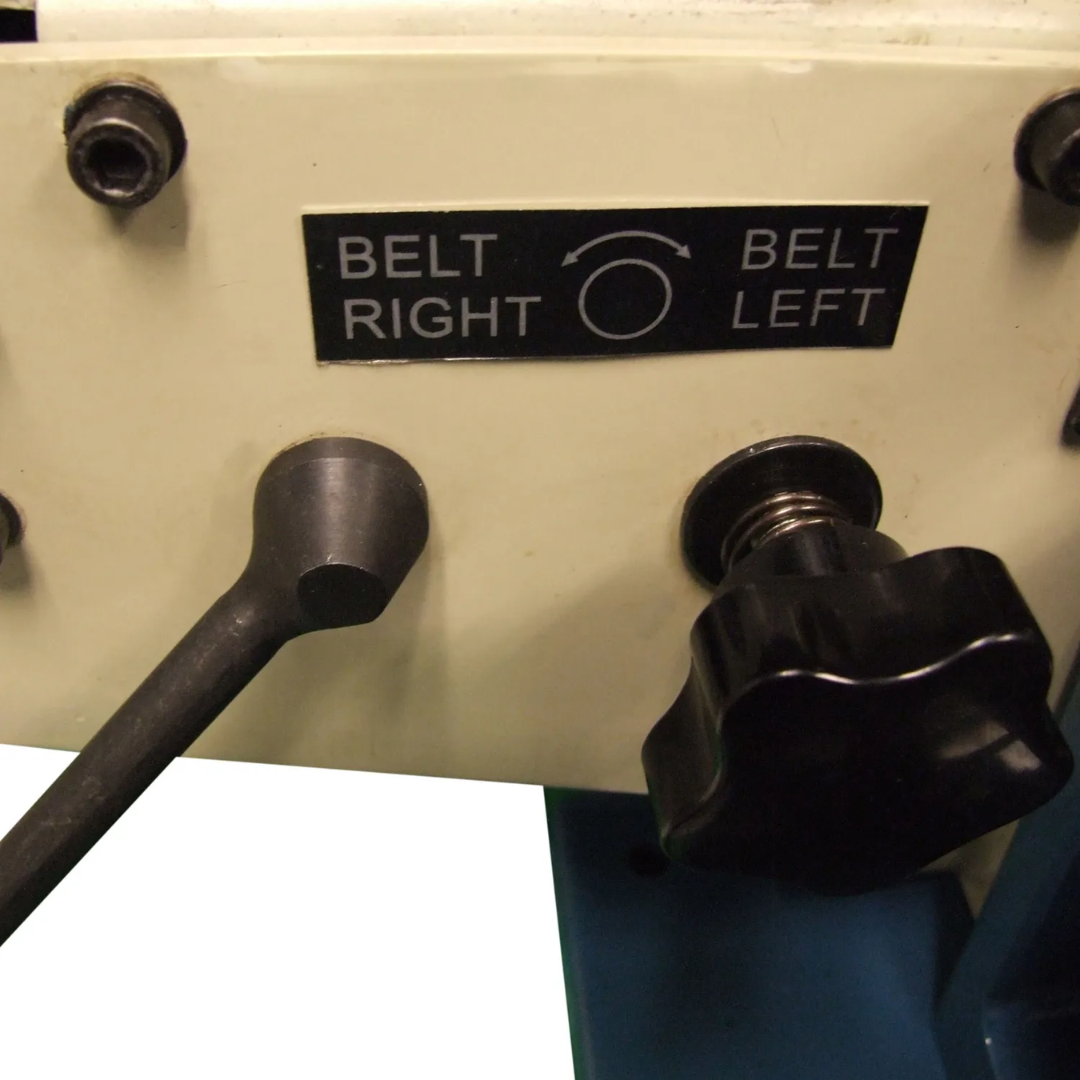 Baileigh Combination Belt and Disk Grinder DBG-62 1002674 belt direction selector controls allowing quick adjustment of belt travel direction for improved grinding flexibility.