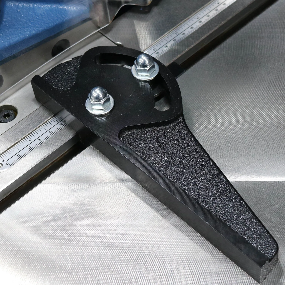 Baileigh Corner Notcher SN-F11-AN 1007236 adjustable sheet metal back gauge and material stop providing accurate positioning for consistent corner notching operations.