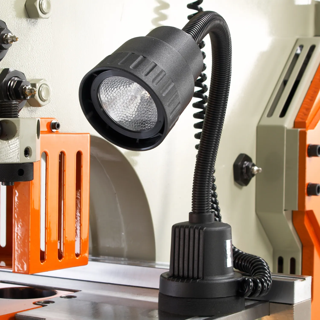 Baileigh Hydraulic Ironworker SW-95 1007865 integrated LED work light illuminating the fabrication area for improved visibility during punching and shearing operations.