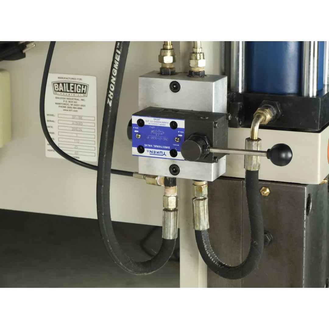 Baileigh Metal Bench Press - (BP-10E) 1000771A ram and tooling assembly detail highlighting precision alignment, adjustable press stroke, and industrial-grade construction.