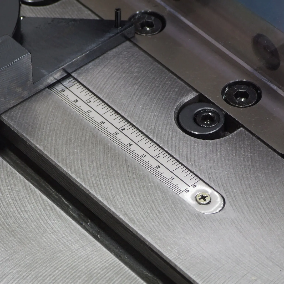 Baileigh Sheet Metal Corner Notcher SN-F09-MS 1007231 precision table guide and measuring scale for repeatable corner notch positioning and accurate fabrication.