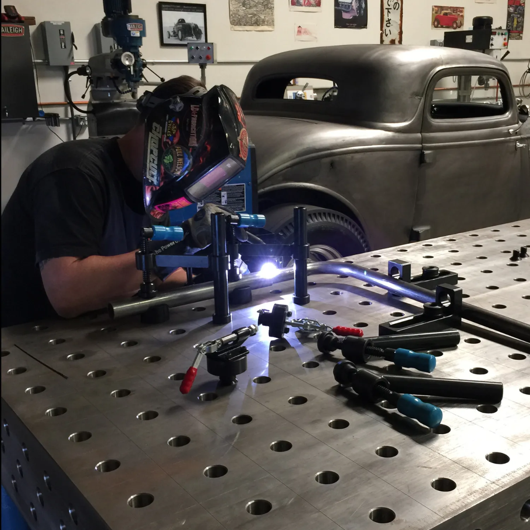 Baileigh Welding Jig Table WJT-4747-HD 1010425 in-use image demonstrating the modular fixture table supporting precision welding, fabrication, and workpiece positioning in a professional shop environment.