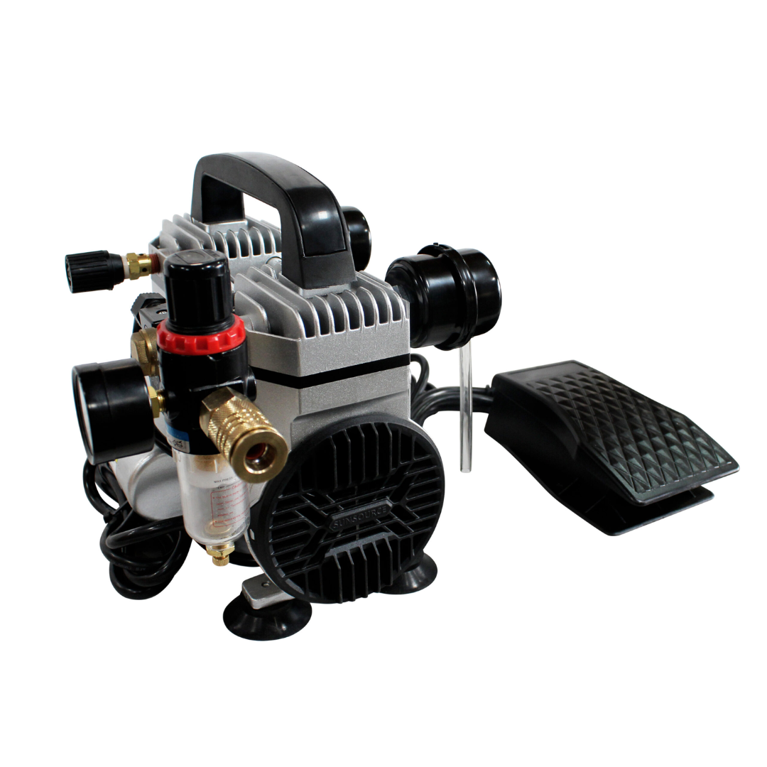 California Air Tools 10TL Ultra Quiet 1.0 Hp Oil-Free Tankless Air Compressor side profile with attached hose and fittings