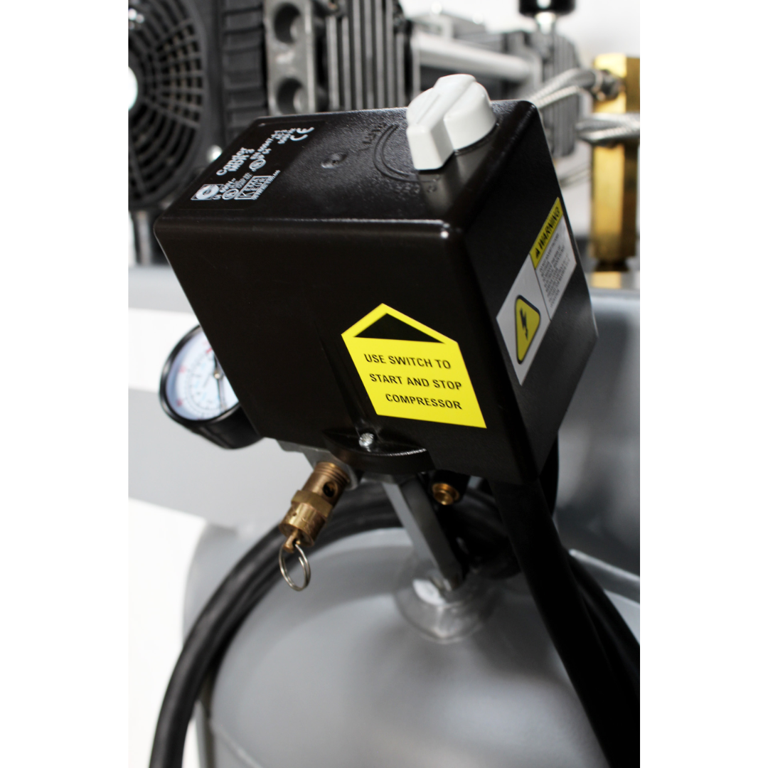 California Air Tools 80060C Powerful 6.0 Hp Ultra Quiet & Oil-Free 80 Gallon Stationary Air Compressor motor housing and safety label detail