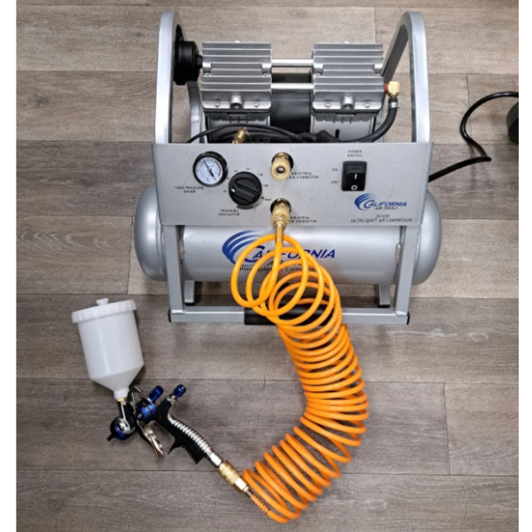 California Air Tools CAT-33000 LVLP Spray Gun with Gravity Feed Cup (Brand New) connected to air hose setup for professional spraying applications