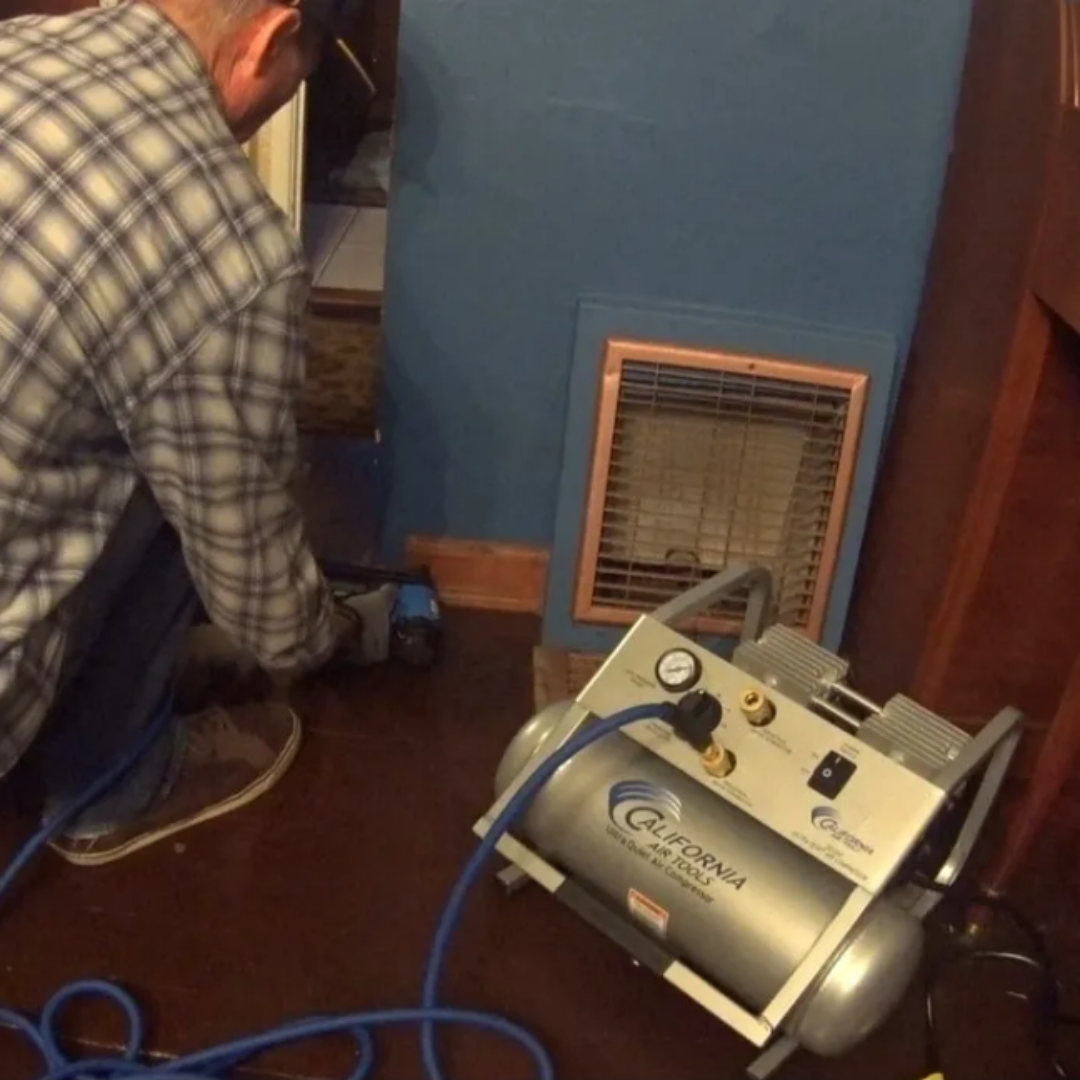 California Air Tools NGTQ18G 18 Gauge Brad Nail Gun (Brand New) in-use application demonstrating fastening wood trim