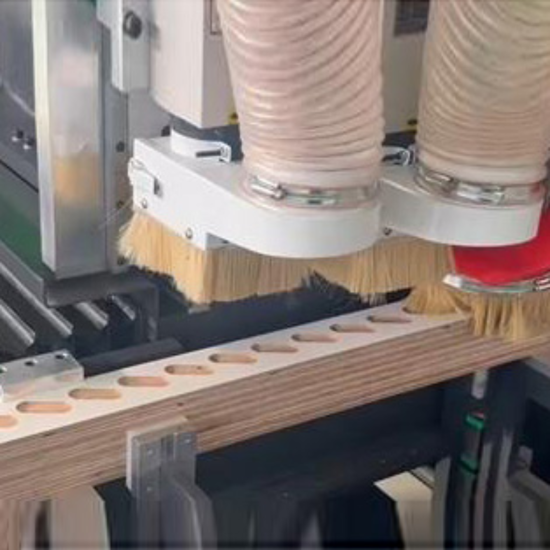 Castaly Outlaw CNC Jamb & Louver 3 axis-Machining Center close-up of multi-spindle routing heads processing wood components