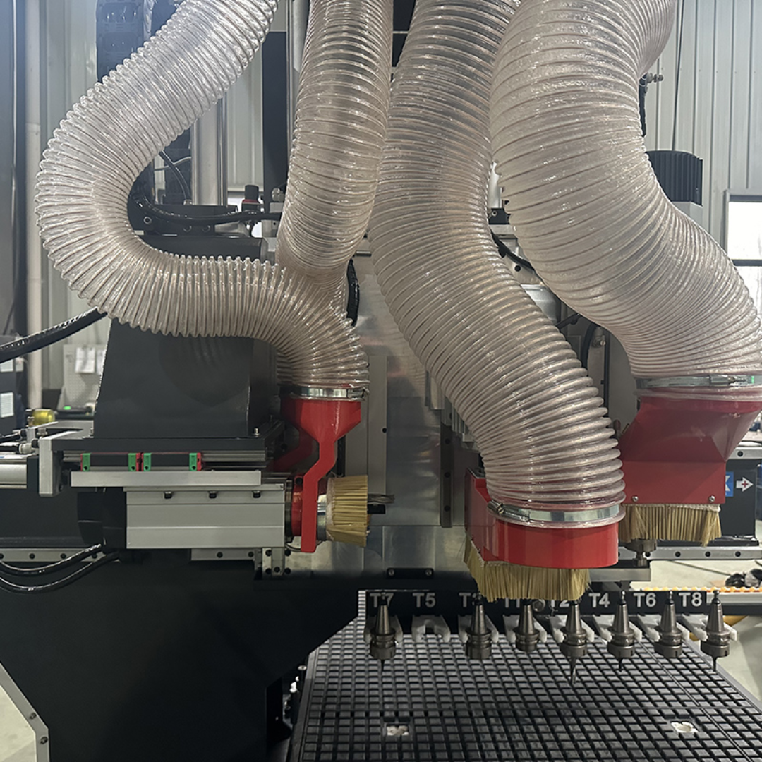 Castaly Rhéa CNC Top Face and One Edge Door Processing Machine Center close-up of multi-spindle heads with dust extraction system