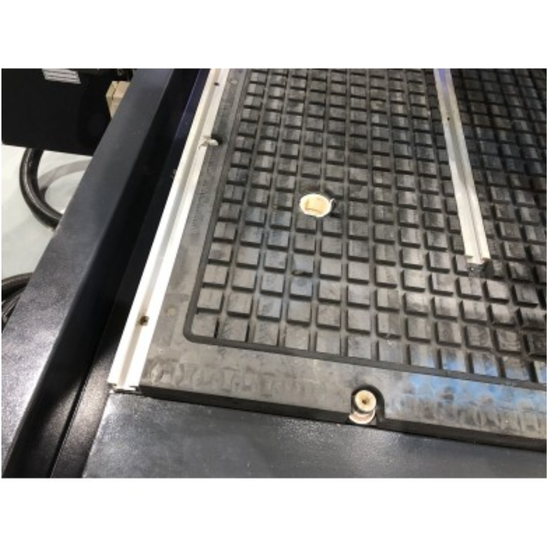 Castaly Universal CNC Router (4 Axis Head) vacuum table surface with material positioning and hold-down system