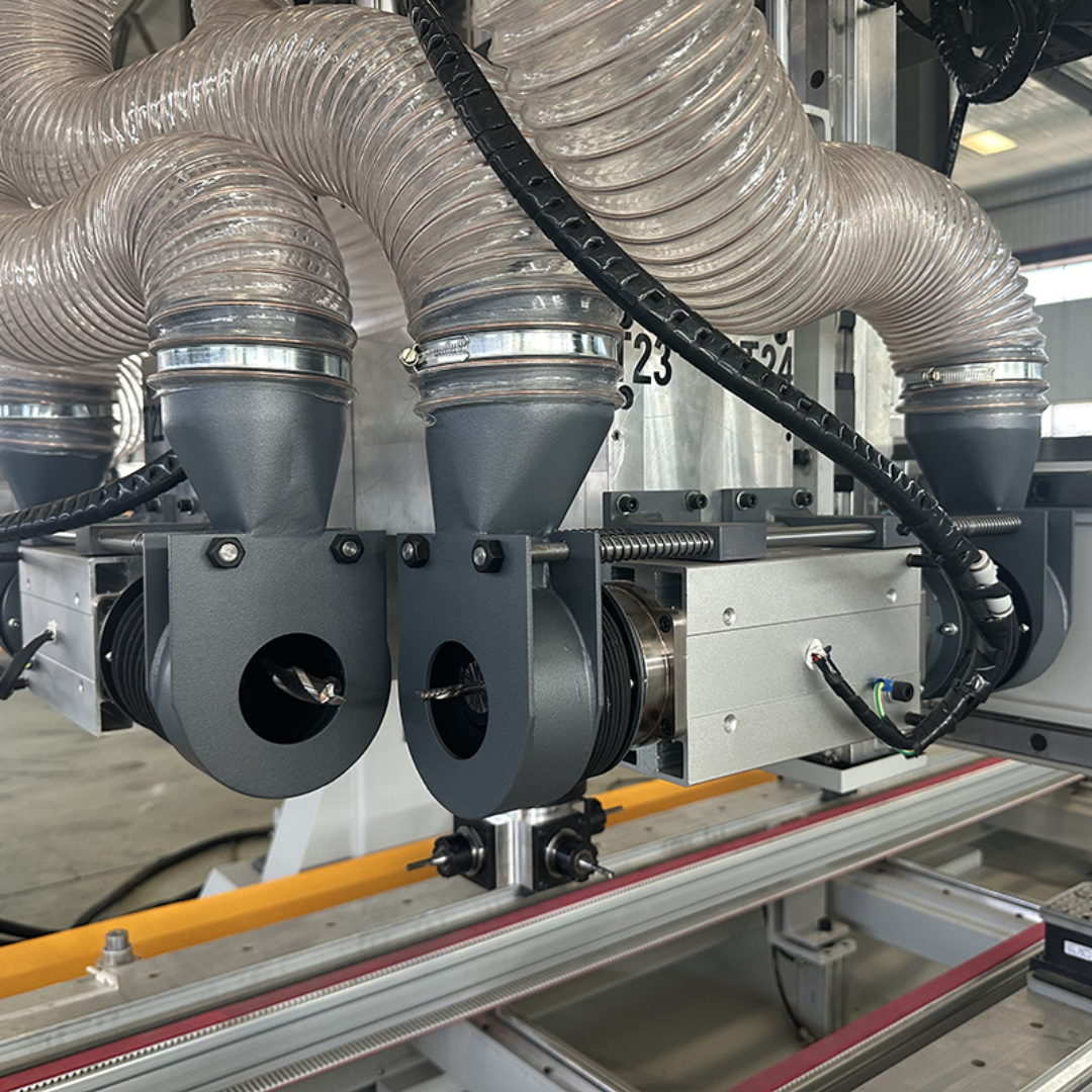 Close-up of Castaly Ares CNC Door Processing Machine Center (Top & 4 Edges) ARTISAN-CNC displaying dust extraction system, multiple machining heads, and advanced edge processing components for high-efficiency door manufacturing.