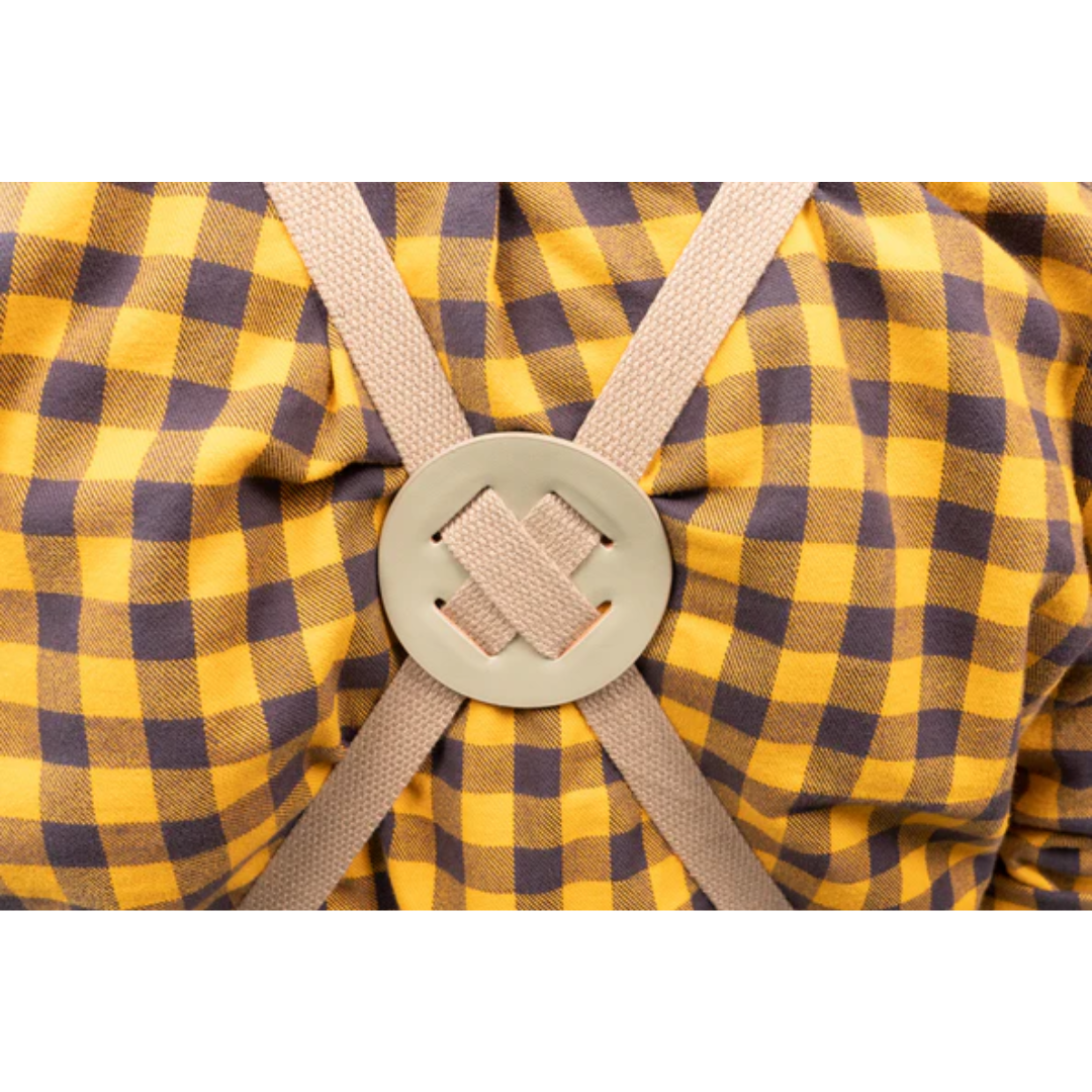 Close-up of Ecopoxy Canvas Apron EPAPR10-CV brass hardware and cross-back strap connection for weight distribution.