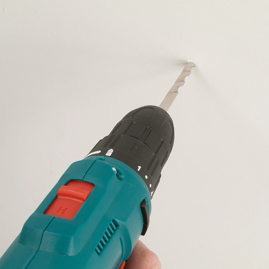 Close-up of Virutex Cordless Drill Driver ATB40 driving a screw into material with steady torque application