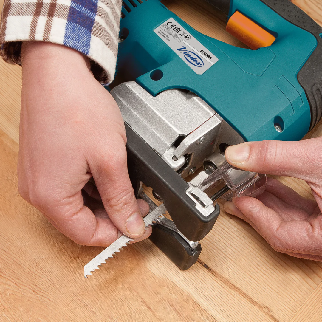 Close-up of Virutex Cordless Jig Saw SCB324 blade installation system for quick and secure blade changes