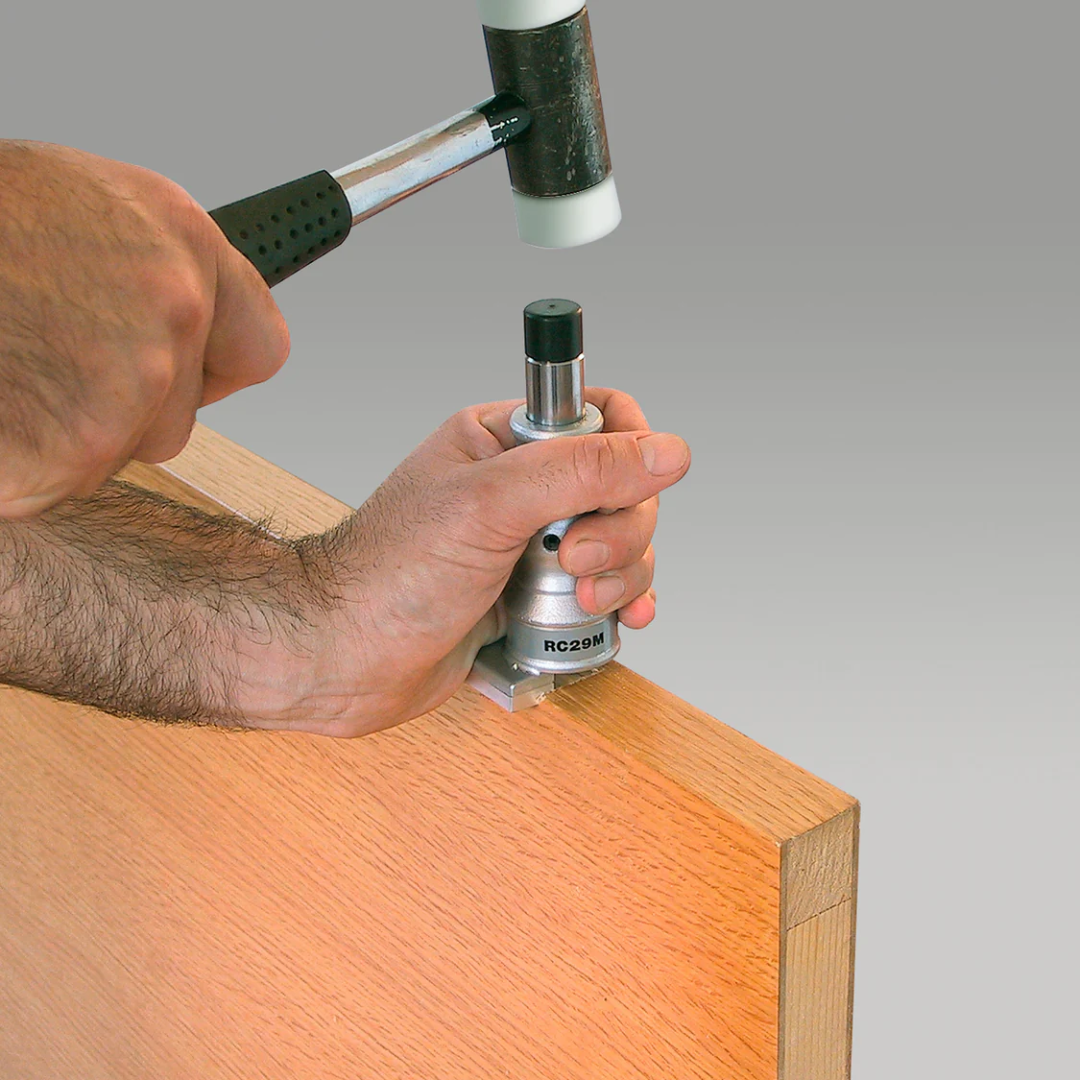 Close-up of Virutex RC29M Square Corner Chisel For Door Mortises being pressed into wood to create clean square door mortise corners