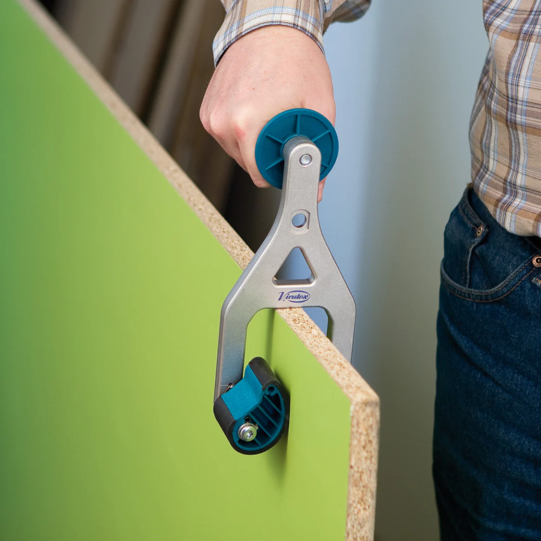 Close-up of Virutex Transport Handle PT81U: Easy Portability 8100100 rolling along panel edge for smooth guided movement and easier transport
