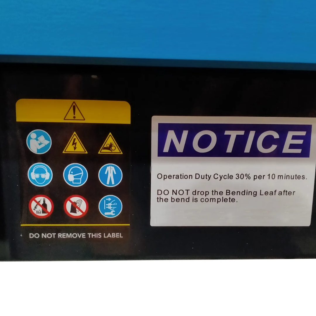 Close-up of the Baileigh 48-Inch Magnetic Sheet Metal Brake (BB-4816M-V2) 1231889 operator interface with safety labels and magnetic brake controls for precise sheet metal forming.