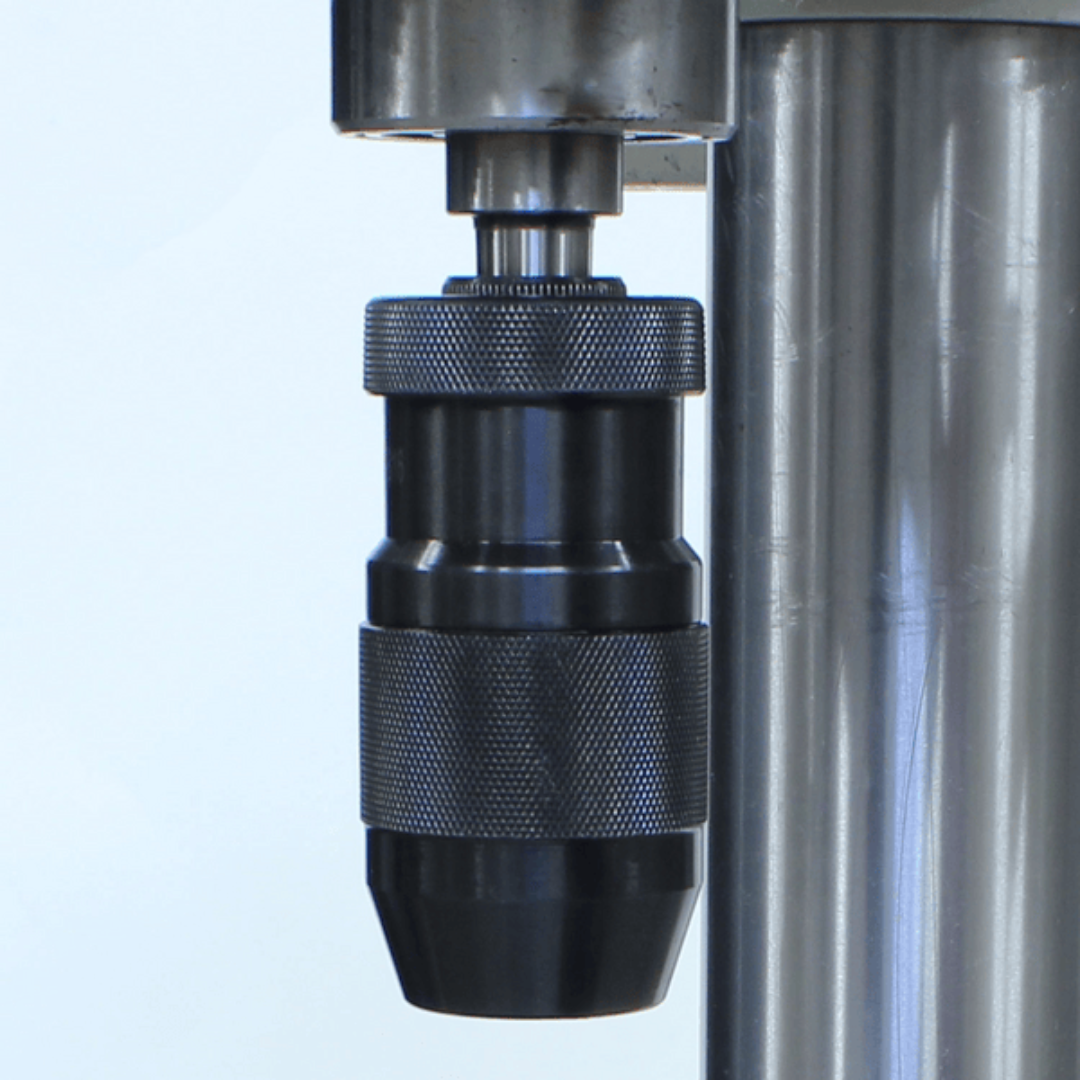 Close-up of the Baileigh Belt Driven Drill Press DP-1000E 1022128 precision drill chuck designed for secure tool holding and accurate drilling performance.