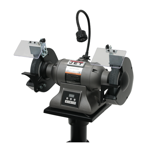 Close-up of the adjustable cast iron tool rest and 8-inch grinding wheel on the JET IBG-8VS