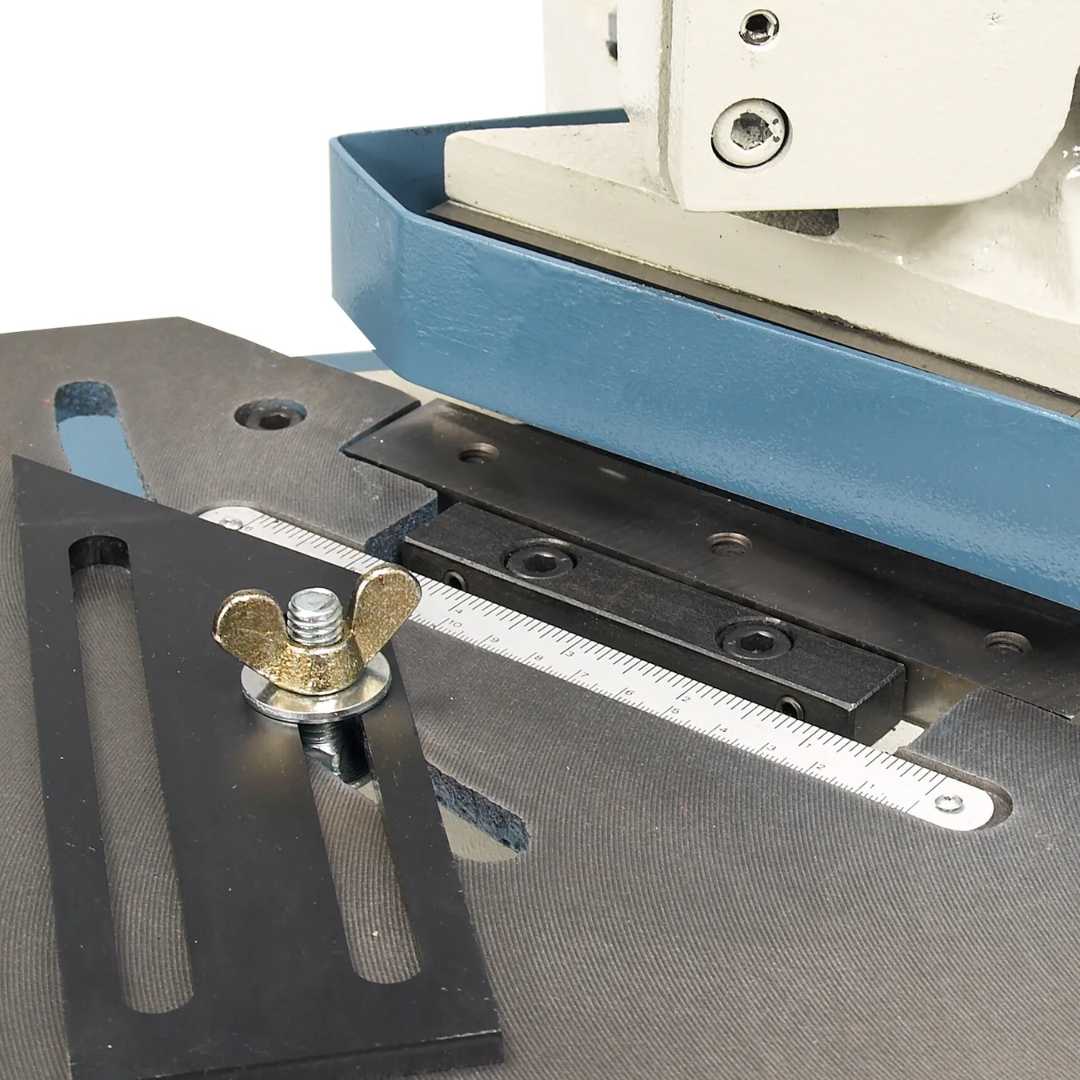 Close-up of the adjustable material stop on the Baileigh Manual Corner Notcher - (SN-F16-HN) 1007260 enabling consistent corner notching and production fabrication work.