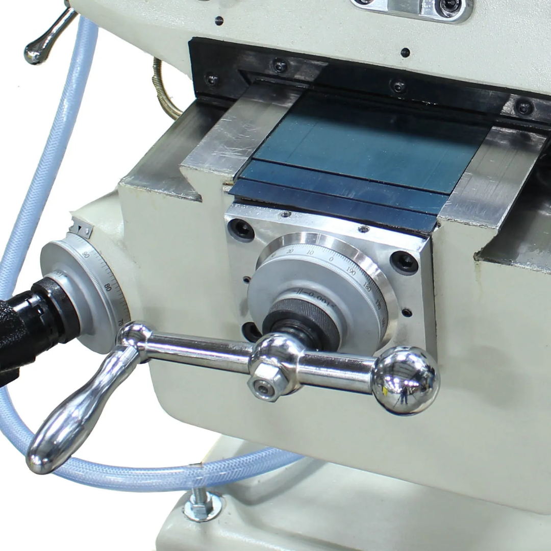 Close-up of the spindle and precision worktable on the Baileigh Vertical Knee Mill - VM-942E-1 1020695 for accurate milling operations.