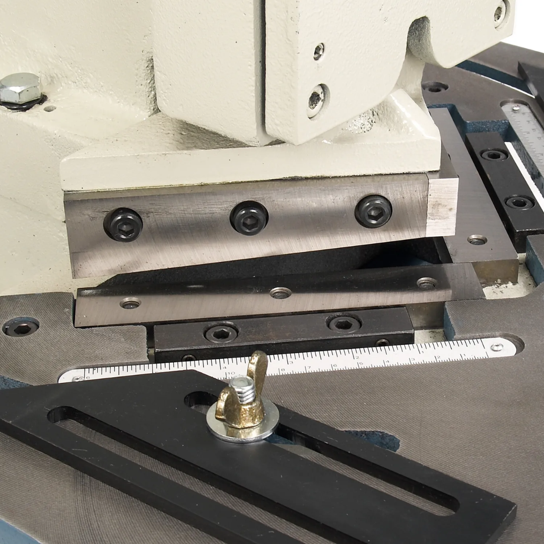 Close-up view of the blade assembly on the Baileigh Manual Corner Notcher - (SN-F16-HN) 1007260 showing precision-cutting components engineered for clean, accurate corner notches.