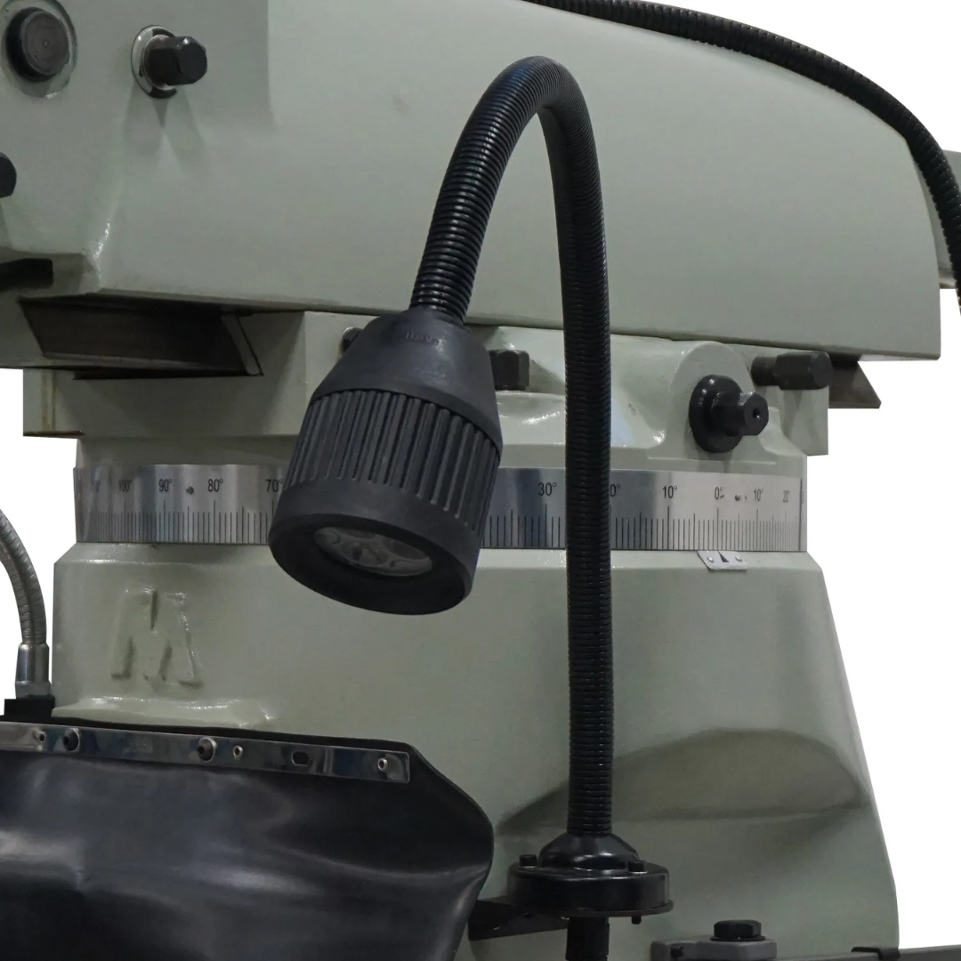 Close-up work light assembly on the Baileigh Vertical Mill VM-949E-VS 1019108 providing enhanced visibility for precision milling and machining operations.