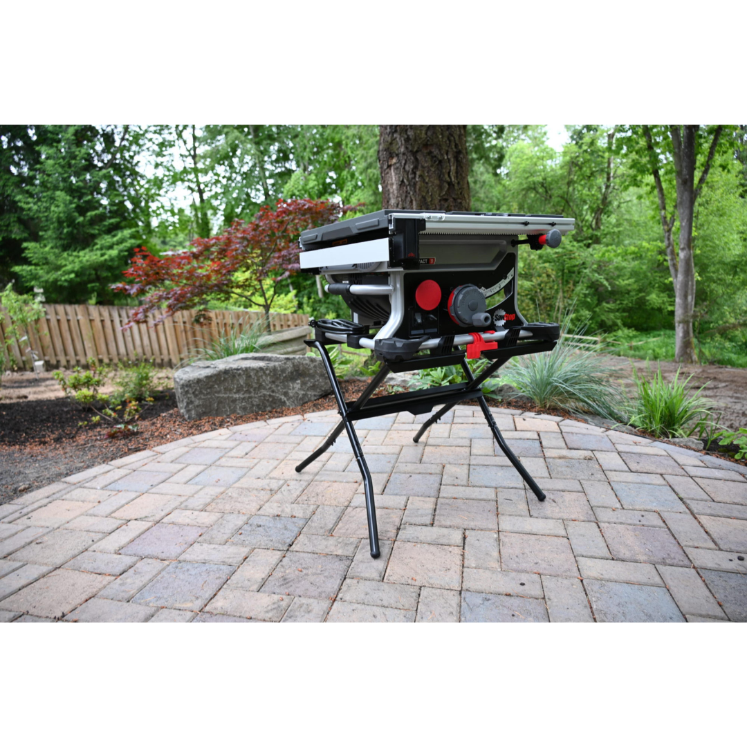 Compact table saw mounted on the SawStop Compact Table Saw Folding Stand CTS-FS at a residential jobsite, showcasing stability, mobility, and ergonomic working height.