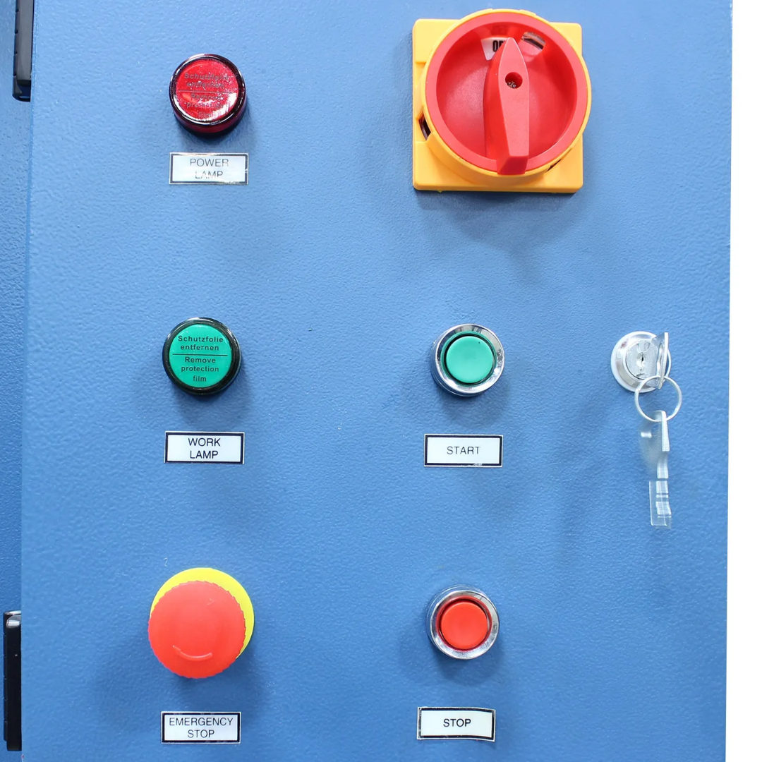 Control panel of Baileigh Two Station Hydraulic Press HSP-200M-C 1019291 featuring industrial push-button controls, emergency stop switch, and operator interface for precise press operation.