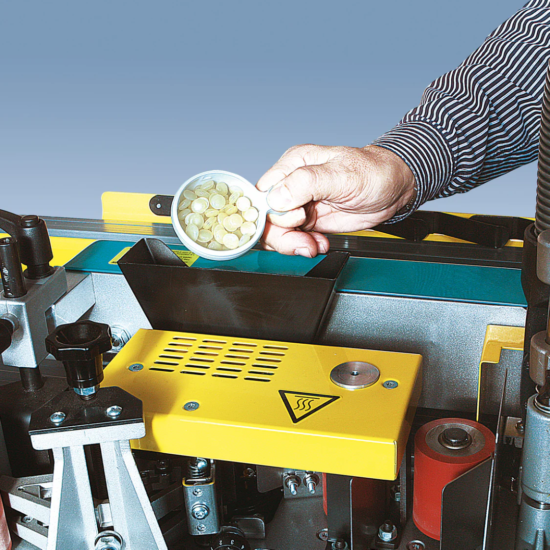 Detail of glue pot and heating system on Virutex Automatic Hot Melt Edgebander Rapid EB135 8500295 for consistent adhesive application