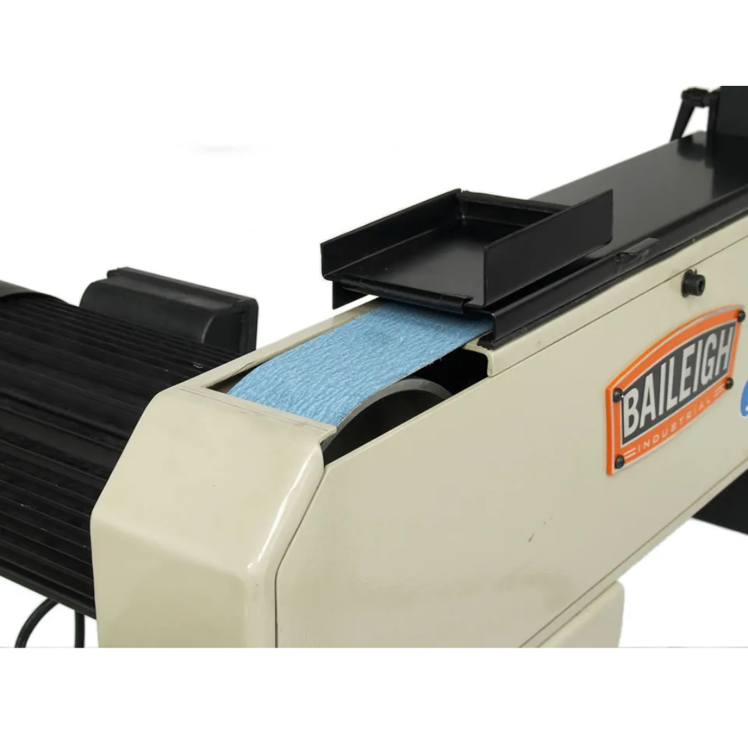 Detail view of the Baileigh Belt Grinder BG-379 1000680 grinding head and belt system highlighting the robust drive mechanism and smooth belt tracking for consistent performance.