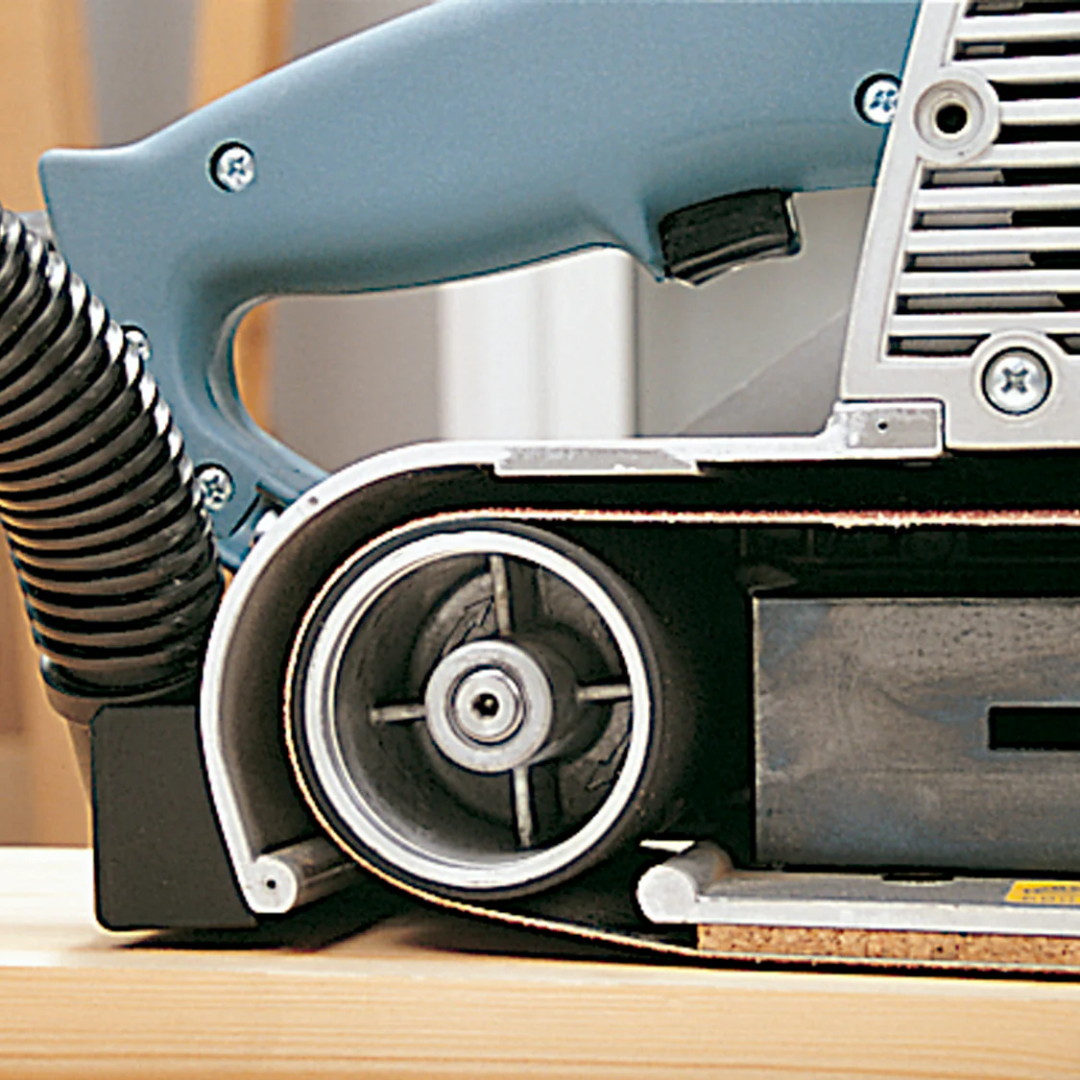 Detailed side view of Virutex Belt Sander LB31E Powerful Sanding Performance showing belt tracking system and dust extraction port