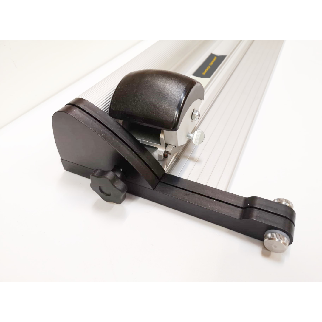Detailed view of Safetyspeed Helios Substrate Cutter end assembly with support rollers for stable material handling.
