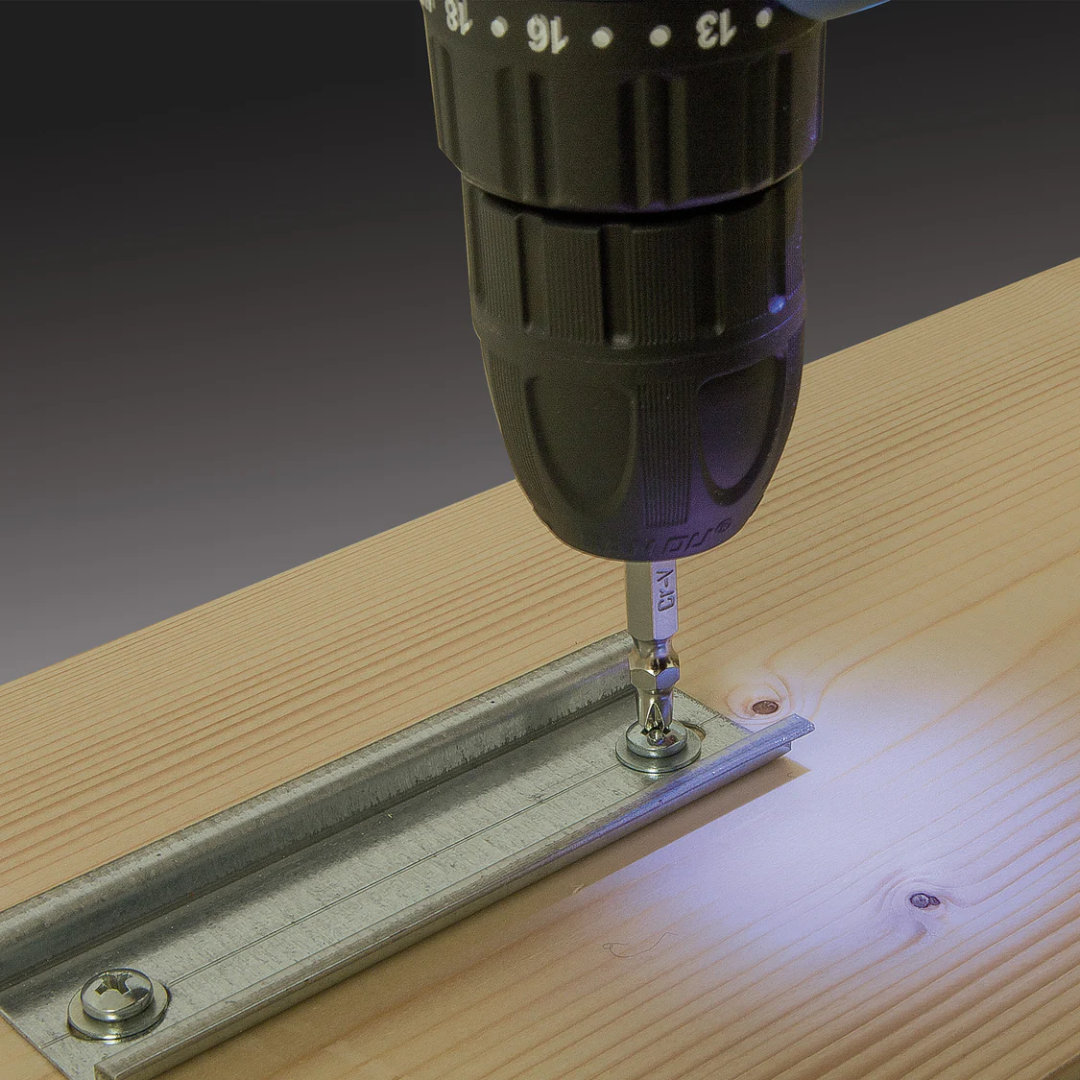 Detailed view of Virutex Cordless Drill Driver ATB40 chuck and bit system during operation
