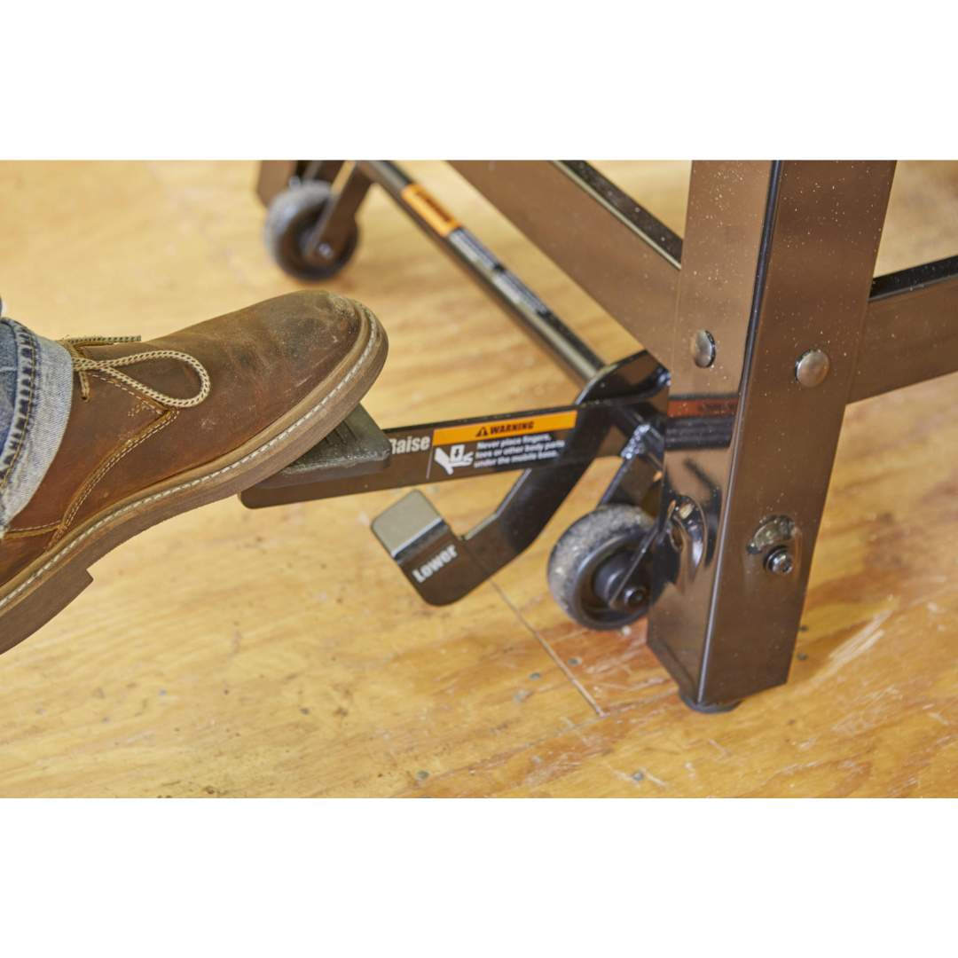 Detailed view of the SawStop Contractor Saw base and mobility components designed for durability and workshop maneuverability.