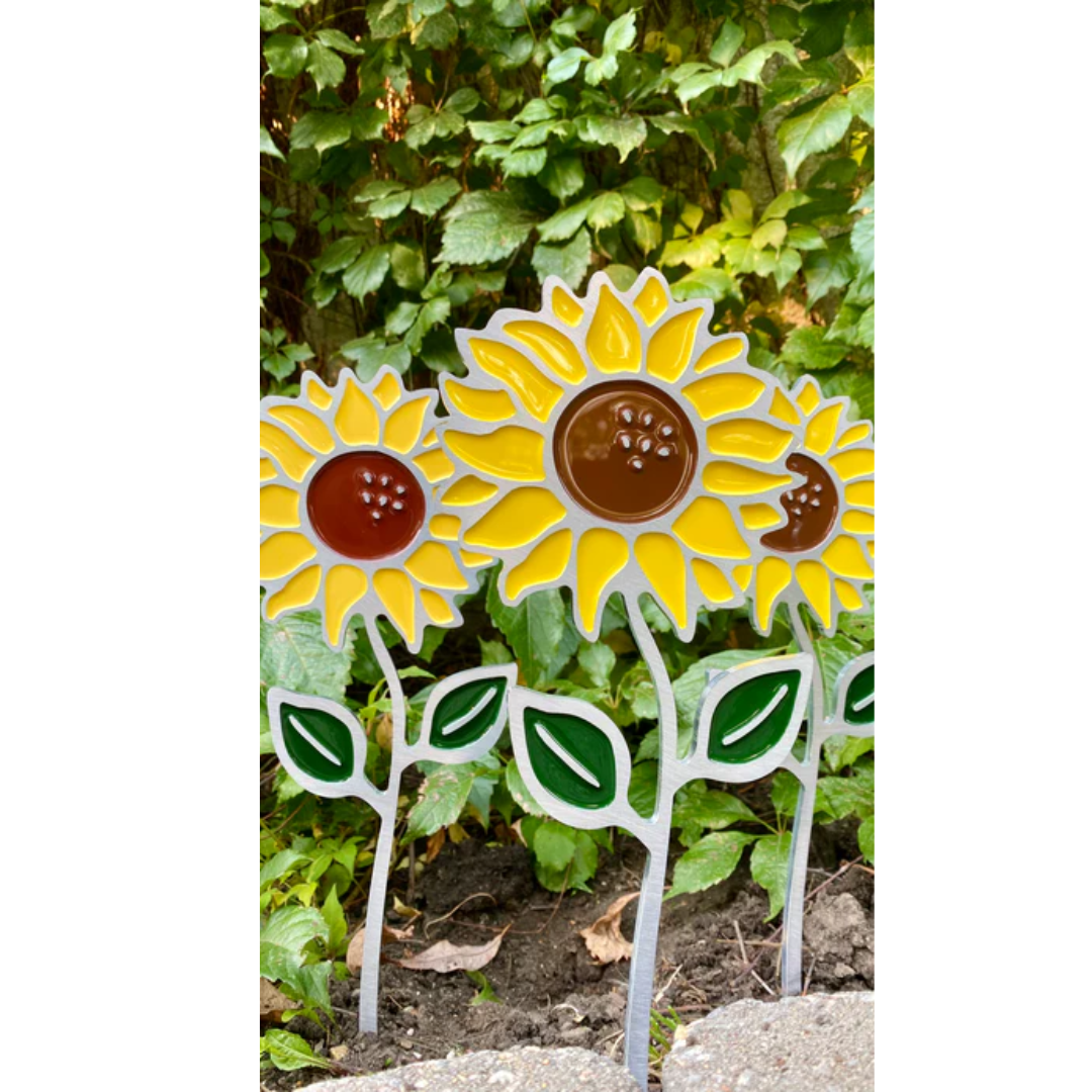 Ecopoxy Liquid Color Pigments used in artistic epoxy project showcasing bright sunflower colors and natural tones.
