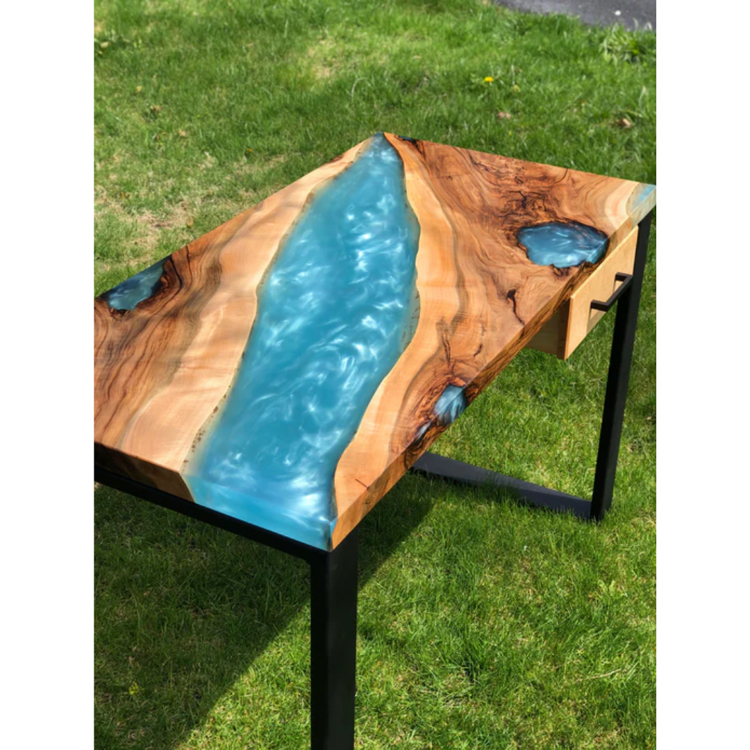 Ecopoxy Metallic Color Pigments used in creative epoxy projects showcasing vibrant metallic effects and custom finishes