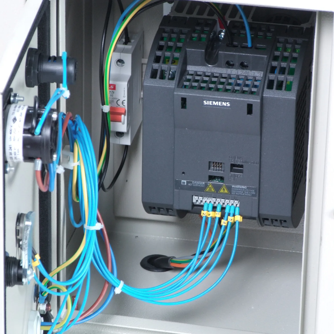 Electrical control cabinet of Baileigh Ring Roll Machine - (R-M40) 1006852 displaying integrated wiring, motor controls, and industrial-grade electrical components.