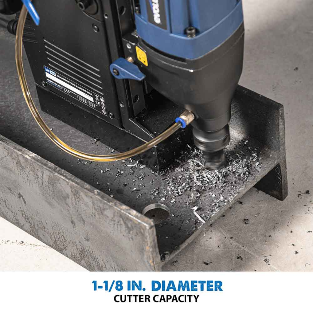 Evolution Power Tools 1-1/8 in. Magnetic Drill With Carry Case S28MAG cutting a clean hole through steel with an annular cutter, providing fast chip evacuation and accurate hole production.