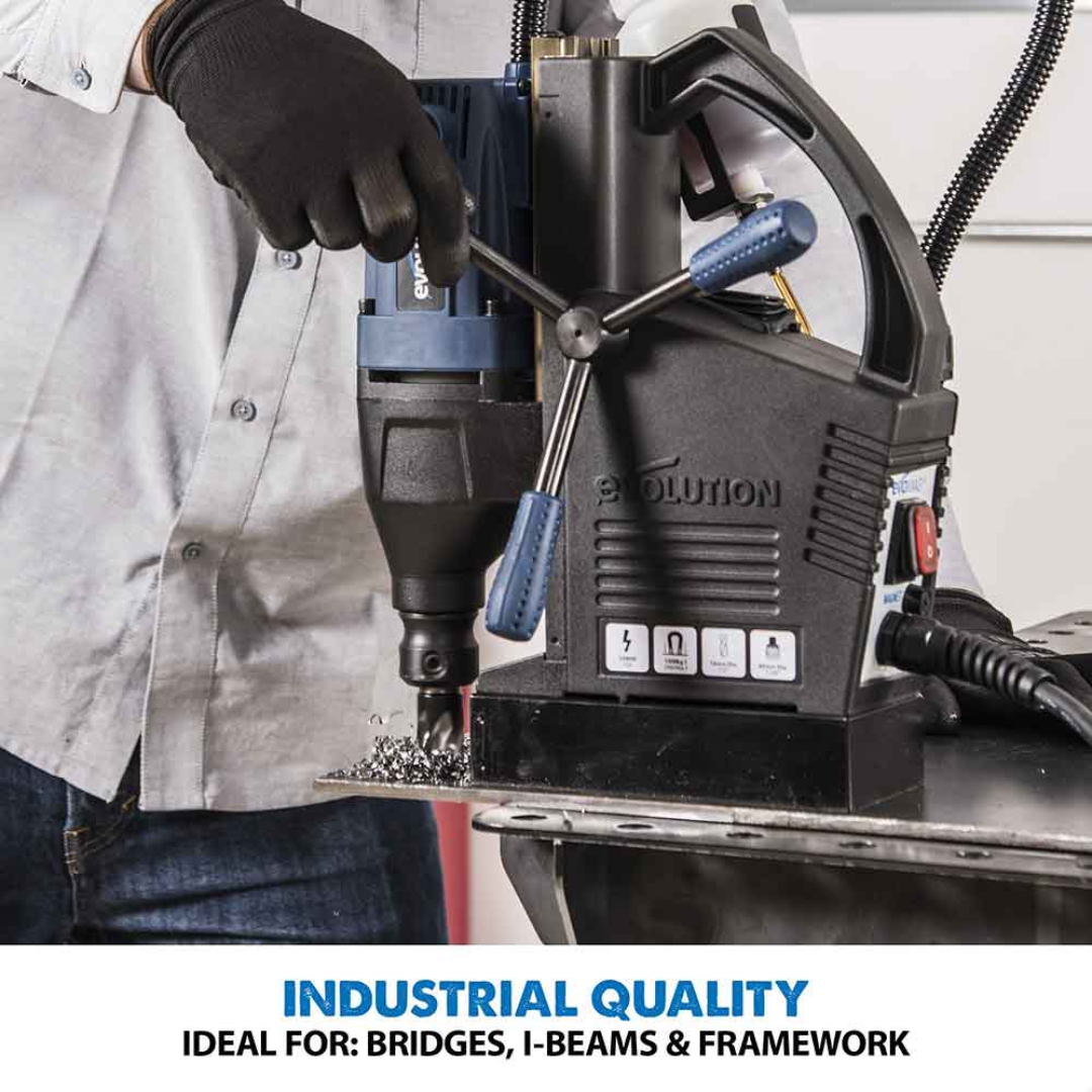 Evolution Power Tools 1-1/8 in. Magnetic Drill With Carry Case S28MAG operating in an industrial fabrication environment, delivering reliable portable magnetic drilling for steel fabrication and manufacturing.