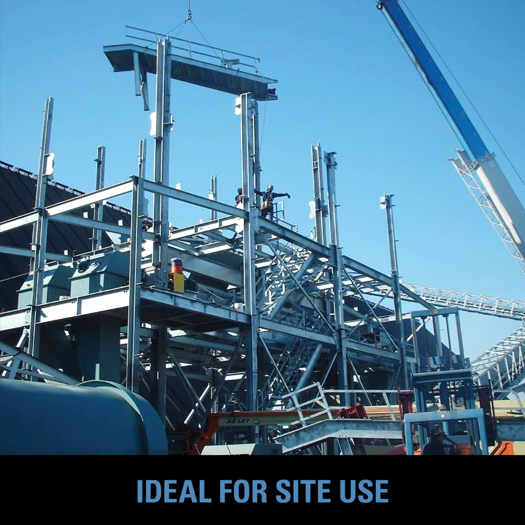Evolution Power Tools 1-5/8 in. Magnetic Drill With Carry Case EVOMAG42 being used on structural steel at a construction site, showcasing portable magnetic drilling performance for professional field applications.