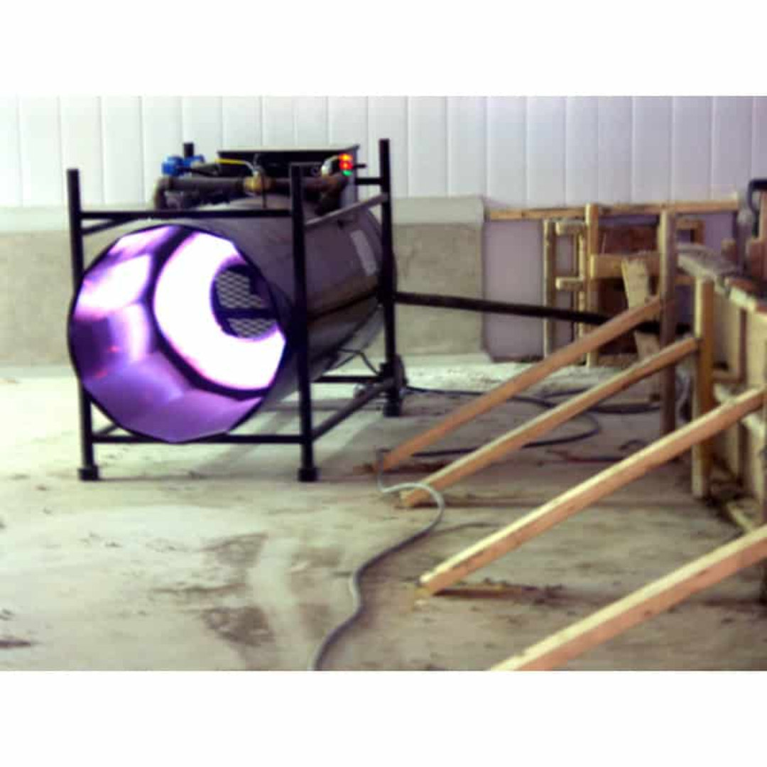 Flagro Direct Fired Heater F-1000T in operation on construction site providing temporary heat with high-output airflow