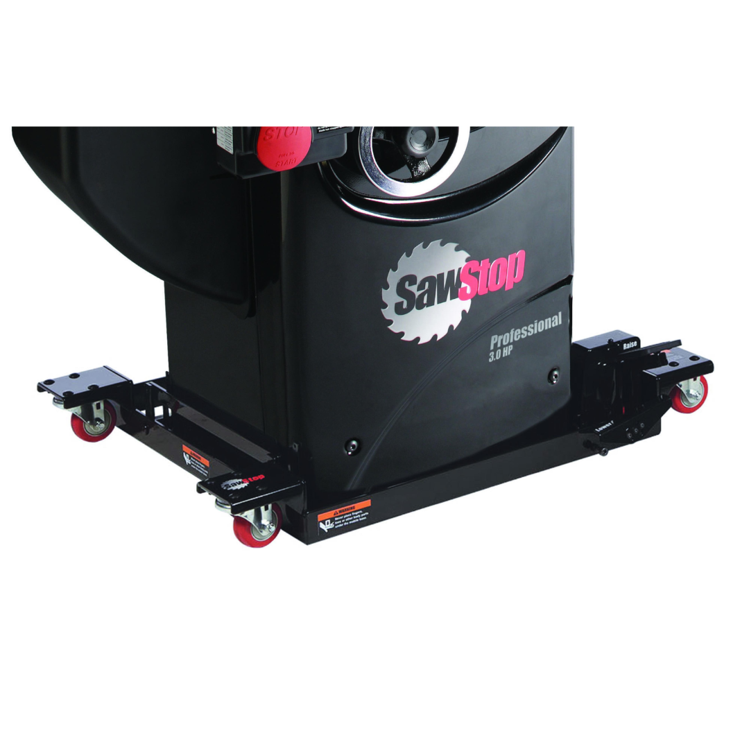 Front angled view of the SawStop Industrial Mobile Base For PCS MB-PCS-IND showing rugged steel construction, precision lifting system, and durable red caster wheels designed for professional woodworking environments.