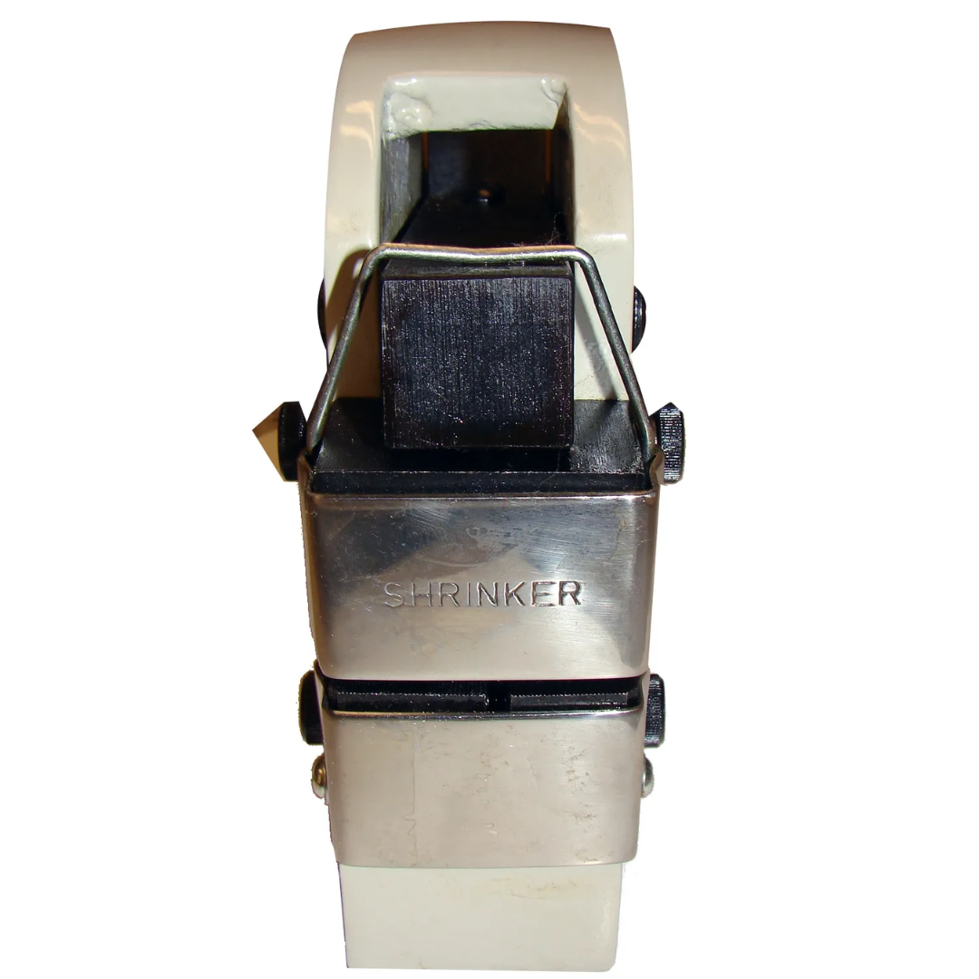 Front close-up of the Baileigh Shrinker Stretcher - (MSS-18) 1005727 highlighting the foot-operated mechanism, forming jaws, and durable cast components designed for accurate metal shaping.