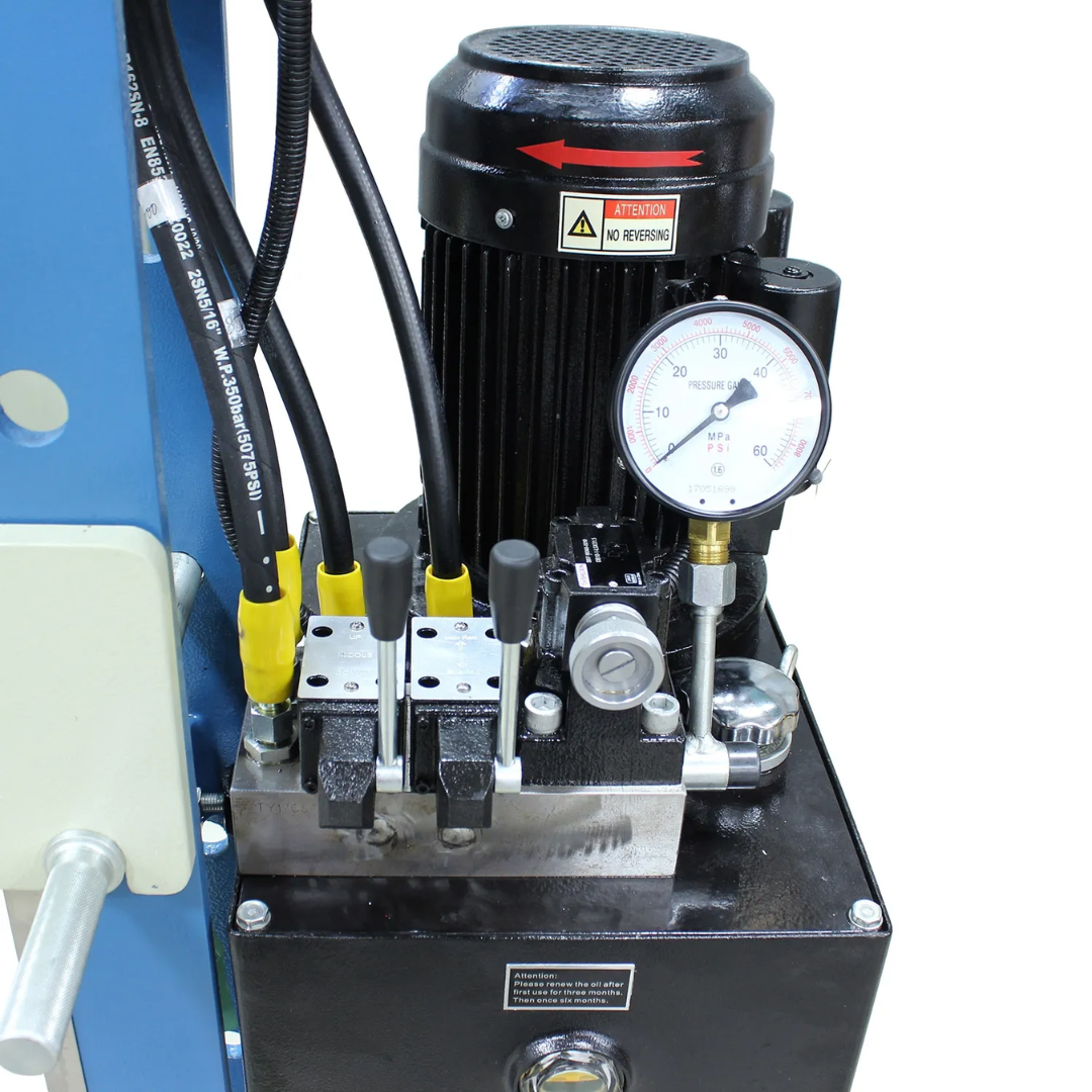 Hydraulic power unit of the Baileigh 30/10-Ton Two-Station H-Frame Hydraulic Press (HSP-30M-C) 1019289 featuring industrial components and pressure gauge.