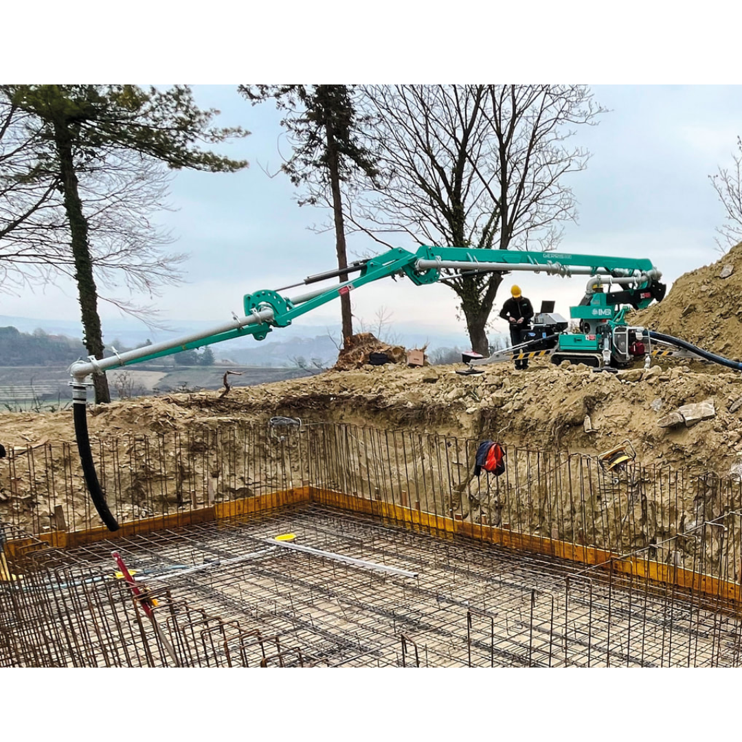 IMER GERRIS 800 Powered Crawler Concrete Placement Boom active foundation concrete placement application demonstrating efficient concrete distribution across reinforced slab construction areas.