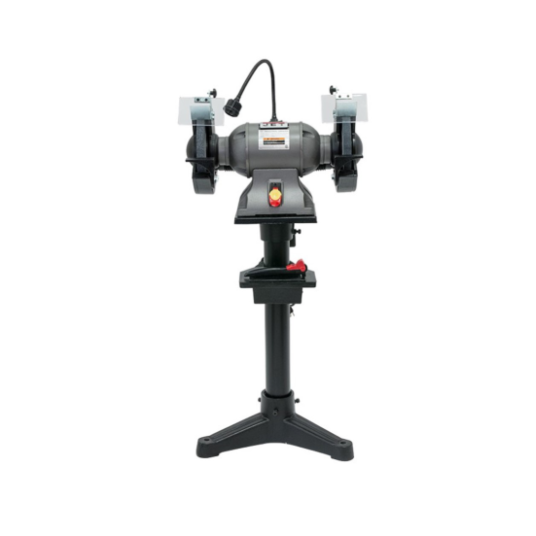 Industrial 1-1/2 HP bench grinder showing adjustable eye safety shields